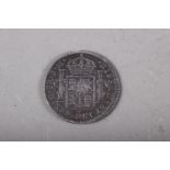 A Spanish Carolus IIII silver dollar with oval countermark