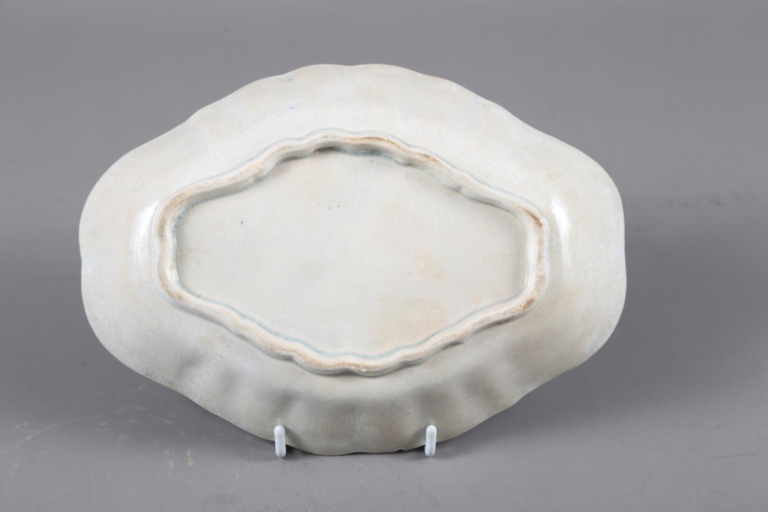 A 19th century blue and white pearlware shaped dish with chinoiserie decoration, 8" wide (chip to - Image 3 of 3