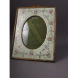 A Continental porcelain and gilt metal mounted photo frame, 11 3/4" high x 9 1/4"w