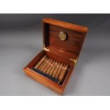 A Lancel of Paris burr walnut humidor, 9 3/4" wide, and twelve Montecristo Habana cigars