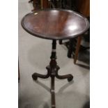 A late 19th century mahogany circular tray top occasional table, on turned and tripod splay