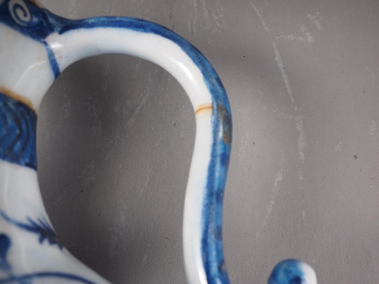 An Isnik blue and white decorated jug with animal head spout, 9 1/2" high - Image 4 of 4