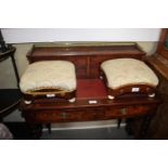 A pair of mid 19th century figured walnut footstools, on ceramic feet, 11" square x 6" high, and a