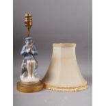 A Royal Copenhagen figure, boy cutting a stick (905), mounted as a table lamp