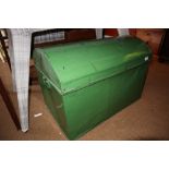A domed topped green painted tin trunk with carrying handles, 29 1/2" wide