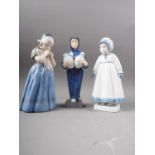Two Royal Copenhagen figures, woman with water jugs (4357), girl with plait (1223) and a Bing &