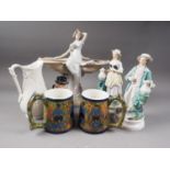 A pair of Staffordshire figures, man and woman with jug, 9 3/4" high, a Royal Dux Bohemia table