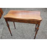 A late 19th century Scandinavian fold-over top serpentine front tea table, on ebonised banded