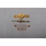 A 9ct gold mourning brooch, a similar brooch set with blue stone and two other brooches, 5.2g gross