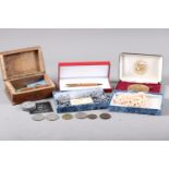 A fountain pen, in Cartier box, pearl necklaces, silver coins, other coinage and two medallions