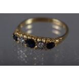 A Victorian yellow metal sapphire and diamond five stone ring, size "Q 1/2", 3.4g,
