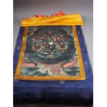 A Tibetan? silk and painted silk scroll with Thangka design, 23 3/4" wide, and another similar