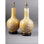 A pair of Chinese bulbous bottle neck table lamps with pate-sur-pate tree, flower and bird