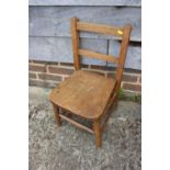 A child's beech and elm panel desk chair, and a footstool with embroidered stag design