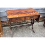 A mahogany and brass line inlaid sofa table, fitted two drawers, on lyre end supports, 57" wide x 20