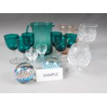 A green glass jug and six wine glass set, six brandy balloons, two flared rim vases, tallest 8 3/