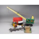 A Meccano Lumar Contractors Model Crane, 17 1/2" high, a Meccano model steam engine and a quantity