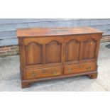An 18th century oak mule chest, now converted as a cupboard, fitted two drawers, on bracket feet,