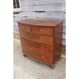 A 19th century mahogany bowfront chest of two short and three long graduated drawers with brass ring