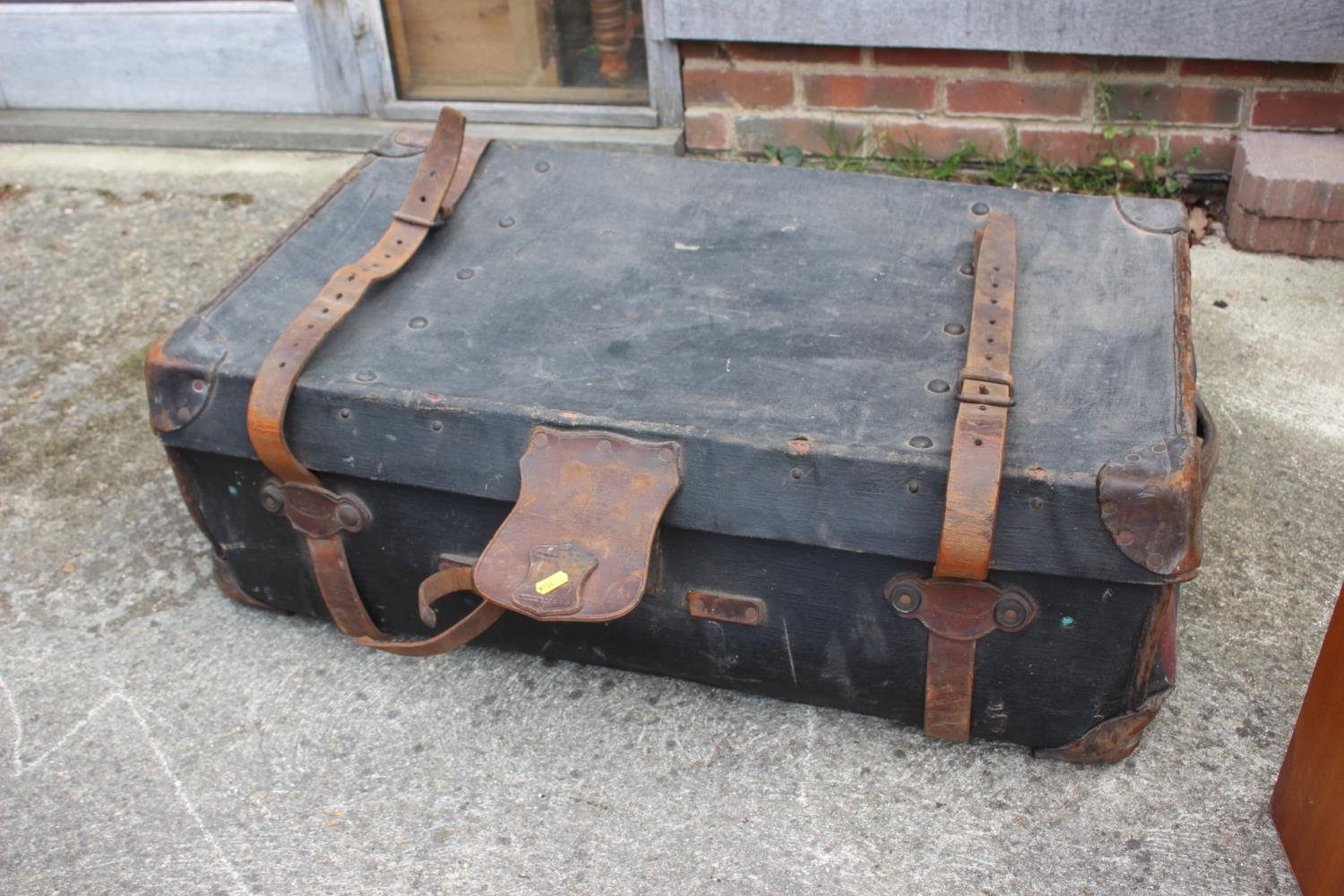 A canvas and leather bound trunk, 36" wide