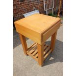 A butcher's "block" kitchen table, fitted one drawer and slatted undertier, 23 1/2" square x 36"