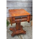 A 19th century mahogany work table, fitted flap top and two drawers, on quatreform base, 34" wide