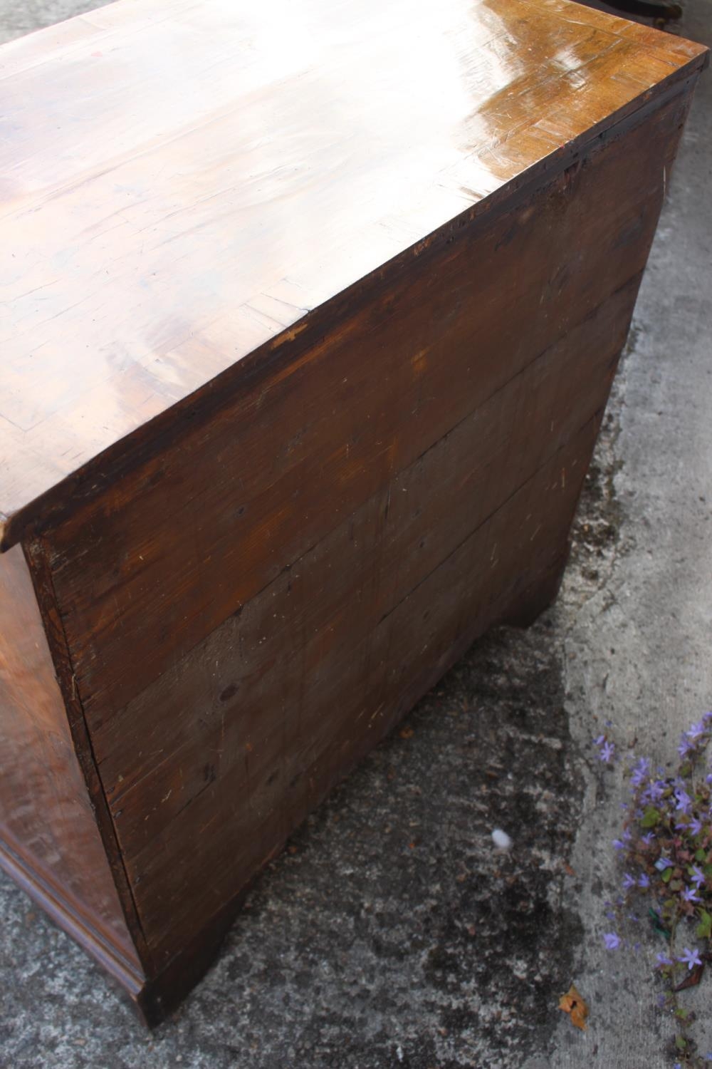 A bachelor's figured walnut and feather banded chest, fitted slide over four long graduated drawers, - Image 6 of 7