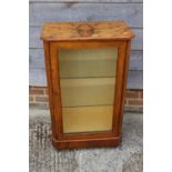 A 19th century walnut an line inlaid side cabinet with two glazed shelves enclosed glazed door, on