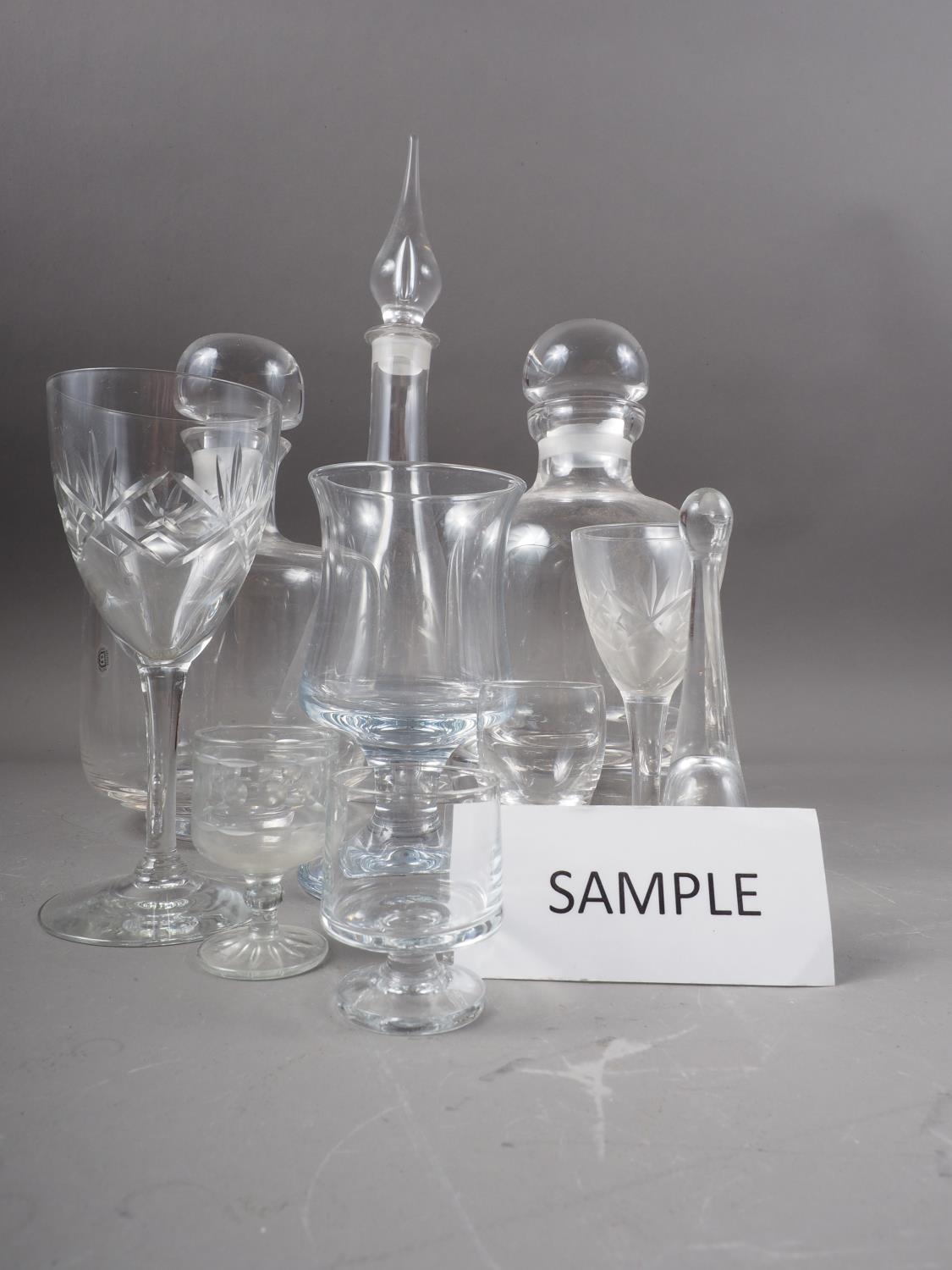 A Dartington decanter, another similar, four other decanters,ÿa Slovenian crystal glass vase, 9 1/4"