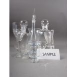 A Dartington decanter, another similar, four other decanters,ÿa Slovenian crystal glass vase, 9 1/4"