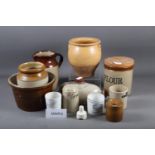 A selection of stoneware items, including two feet warmers, a flour jar, two plant pots, a "Beef