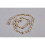 A yellow metal twisted link necklace, stamped 375, 16" long, 33.9g