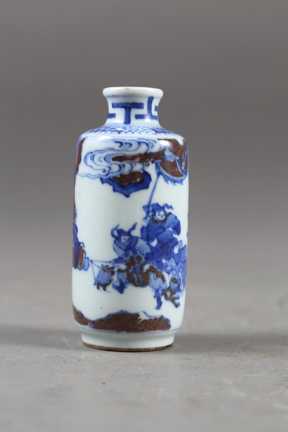 A Chinese blue, white and iron oxide glazed cylindrical miniature vase with warriors in a - Image 12 of 13