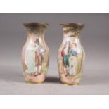 *A pair of French baluster enamelled vases with figures in a landscape decoration, 6" high (damages