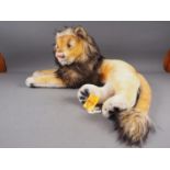 A Steiff 1956 vintage recumbent Leo the Lion soft toy, 24 1/2" long overall