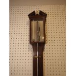 An early 19th century walnut stick barometer with vernier by James Lillia