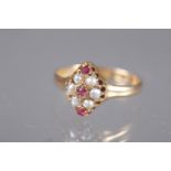 A 15ct gold ruby and seed pearl dress ring, size P, 2.1g