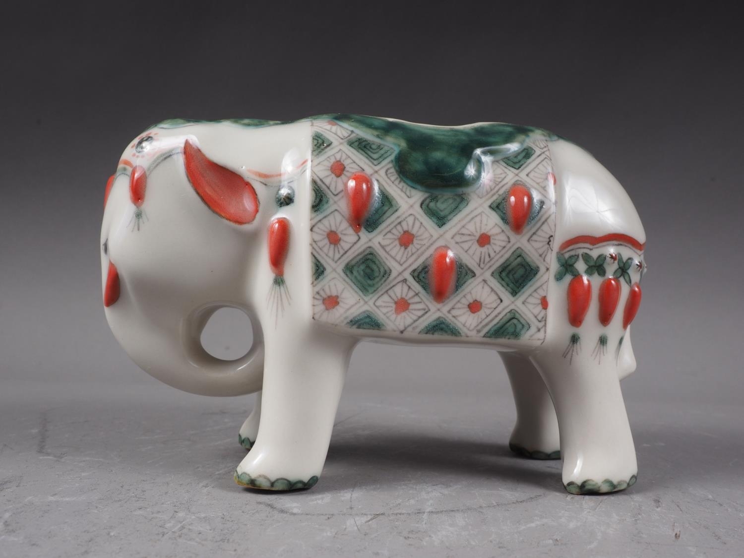 A Chinese polychrome decorated elephant, 4 1/2" high