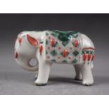 A Chinese polychrome decorated elephant, 4 1/2" high