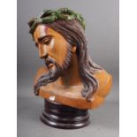 A carved mixed hardwood bust of Christ, 14 1/2" high