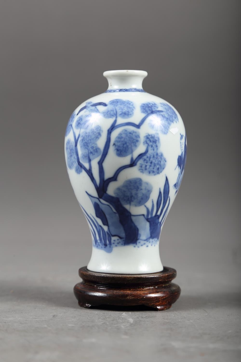 A Chinese blue and white meiping vase with figure on horseback in a landscape decoration, 4 1/4"