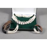 A freshwater pearl mutli-strand necklace, in box, a similar faux pearl and leather choker necklace
