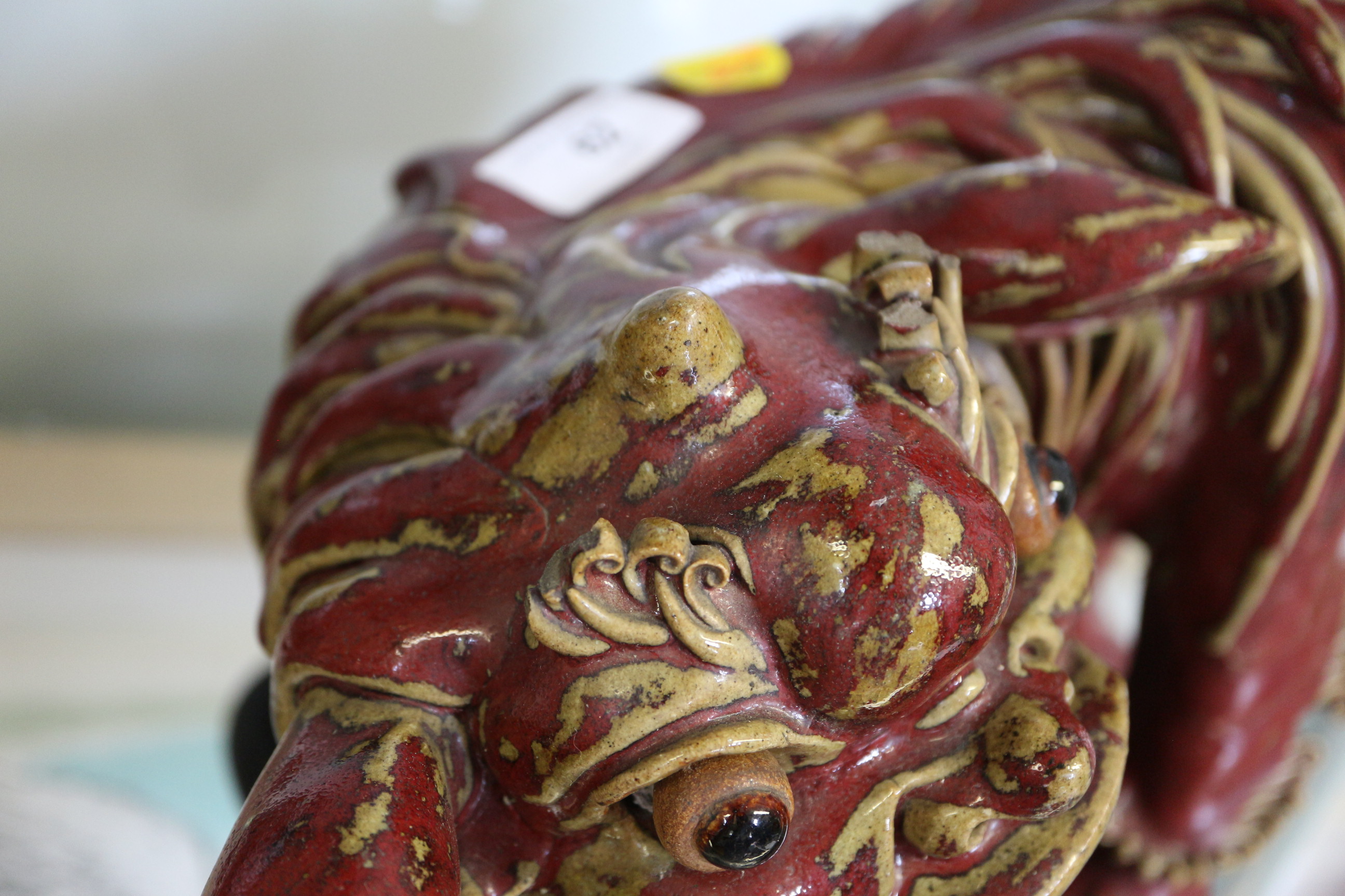 A Chinese red and brown glazed porcelain model of a Dog of Fo, on hardwood stand, 16" high - Image 11 of 17