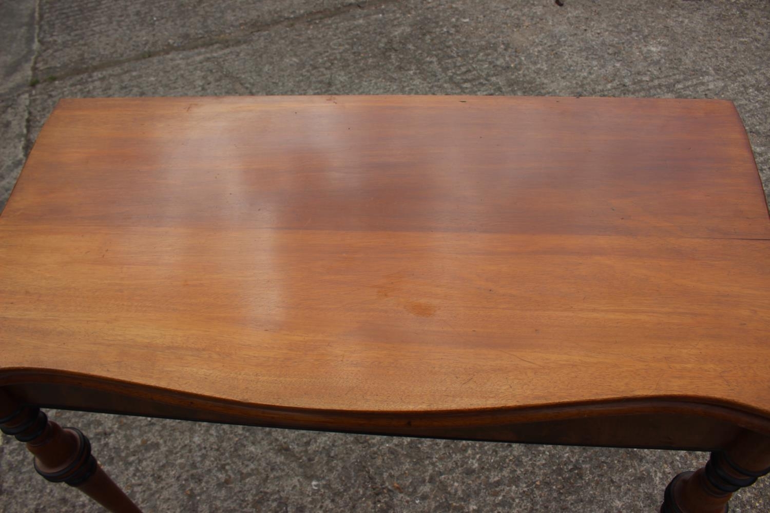 A late 19th century Scandinavian fold-over top serpentine front tea table, on ebonised banded - Image 2 of 5