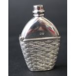 A Victorian novelty silver vesta case, formed as a spirit flask in wicker basket, Adie & Lovekin