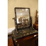 A Victorian papier-mache swing frame toilet mirror with floral and pheasant decoration, plate 17"