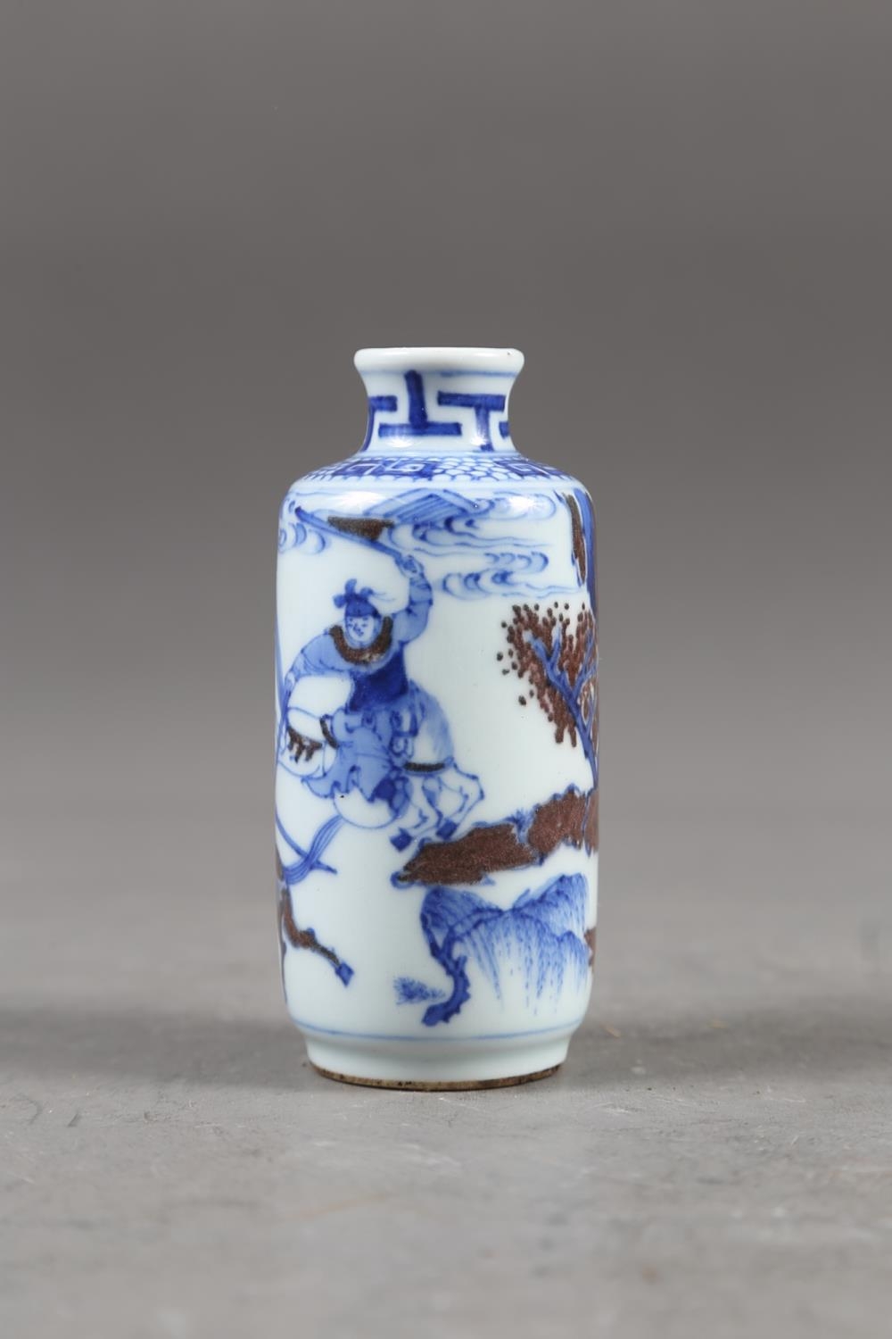 A Chinese blue, white and iron oxide glazed cylindrical miniature vase with warriors in a - Image 10 of 13