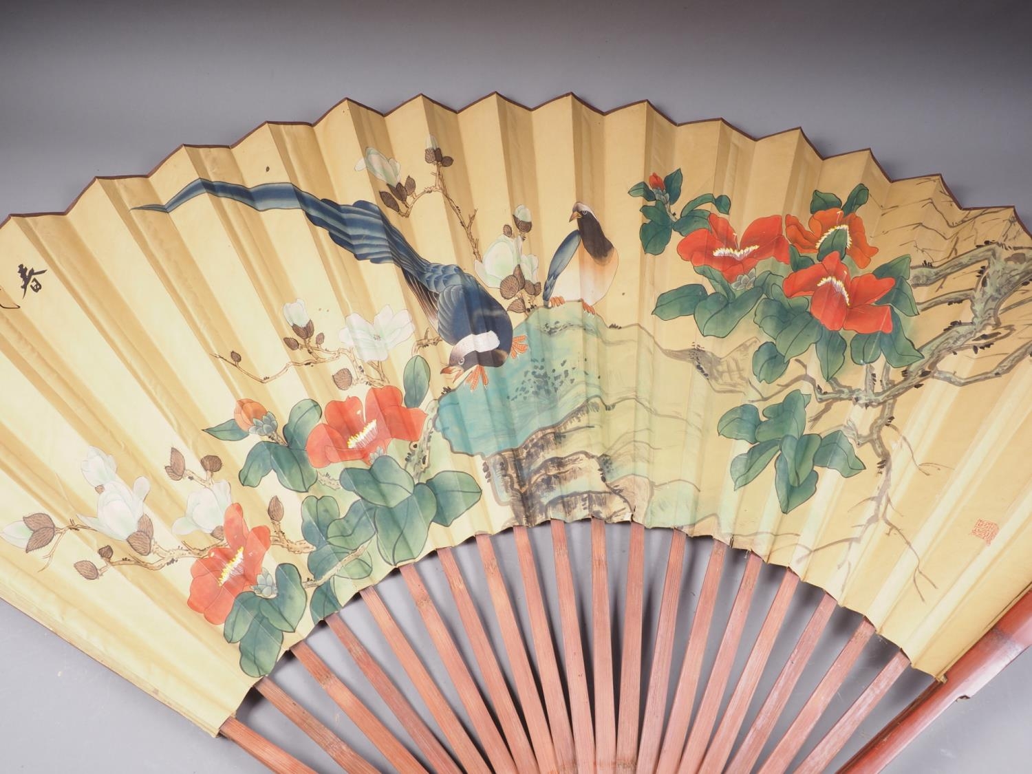 A Japanese fan with painted bird and flower decoration, 34 3/4" high, and two other similar - Image 2 of 2