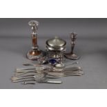 A silver plated adjustable candlestick with embossed decoration, on circular base, 9 1/2" high (