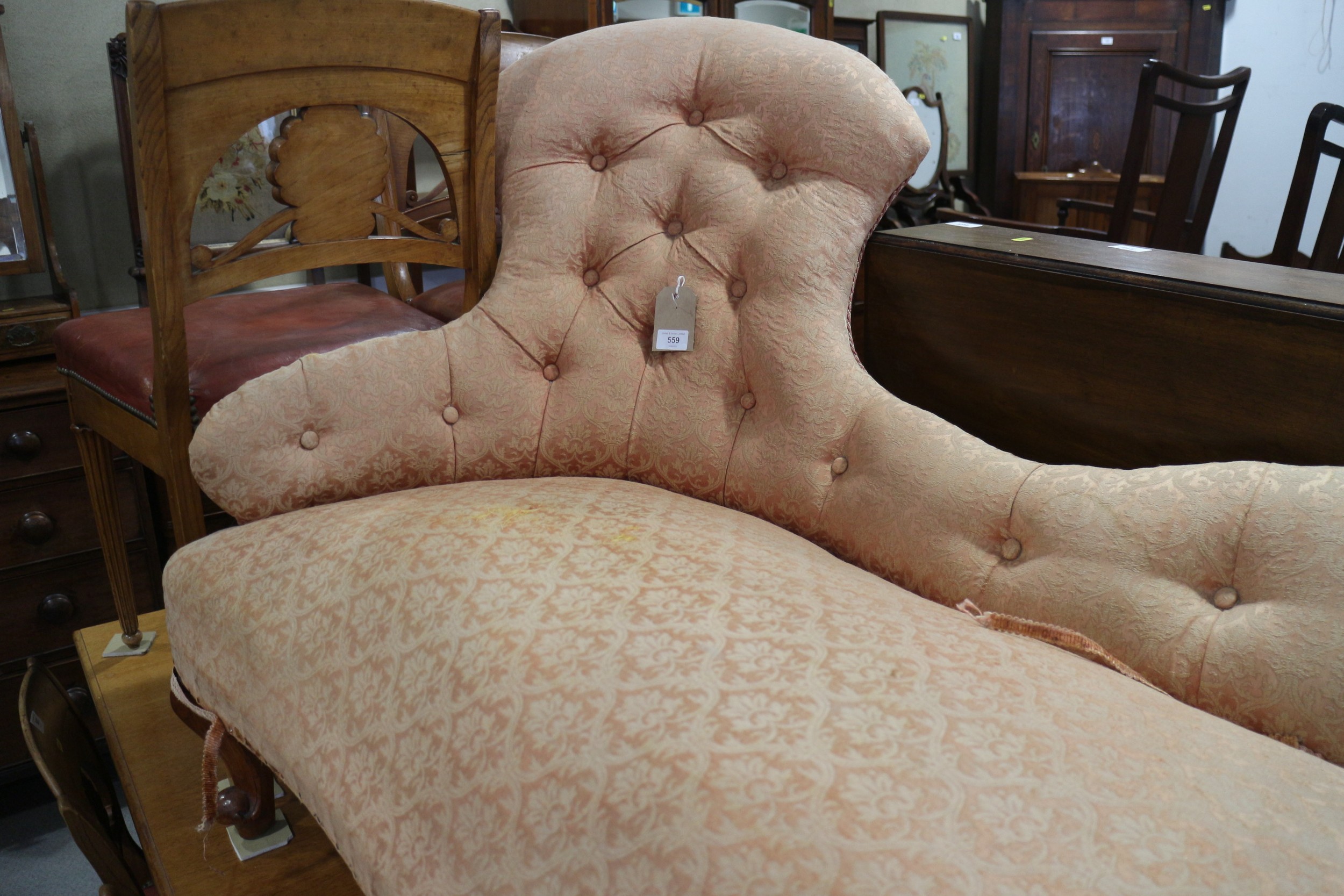 A late 19th century shaped back chaise longue, button upholstered in a peach brocade, on cabriole - Image 2 of 2